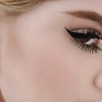 Close-up image highlighting eye makeup with dramatic eyeliner and false eyelashes, featuring earrings and facial details.
